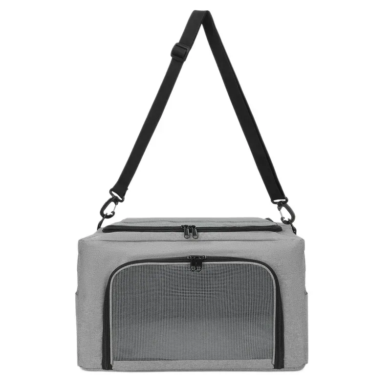Grey pet carrier bag with a front mesh window and carry strap