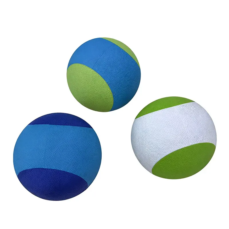 Blue, green and white floating rubber dog balls