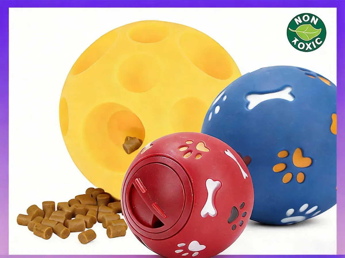 Cheese shaped treat ball with red and blue paw balls
