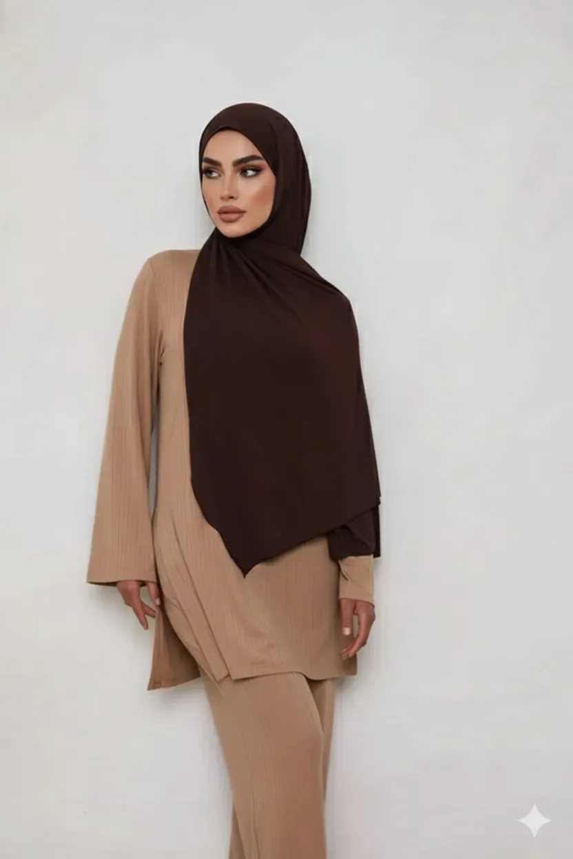 Model wearing a brown jersey hijab with a camel longline top for a modest layered outfit