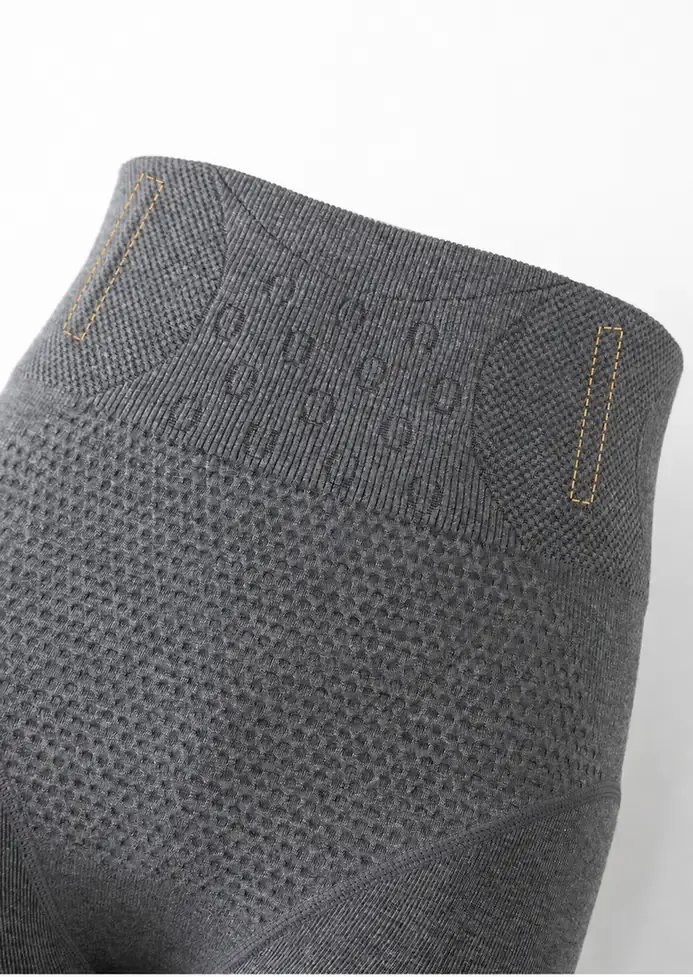Close-up of the compression waistband detail on custom women’s seamless fleece-lined shaping leggings