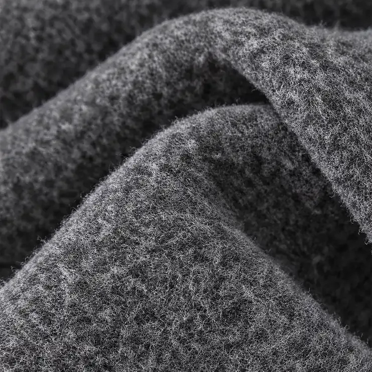Close-up of the fine grey brushed fleece lining inside thermal leggings