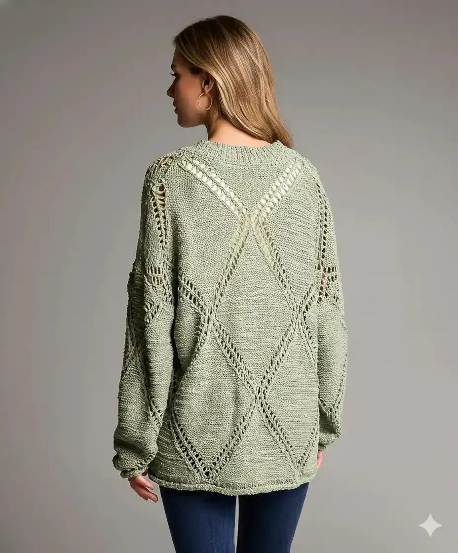 Back view of the oversized sage green diamond pointelle sweater with raglan sleeves