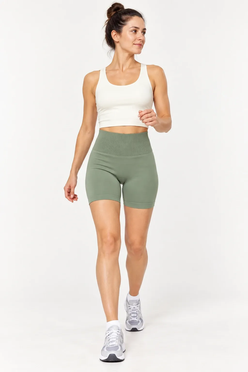 Women's olive green seamless high-waisted biker shorts, front view