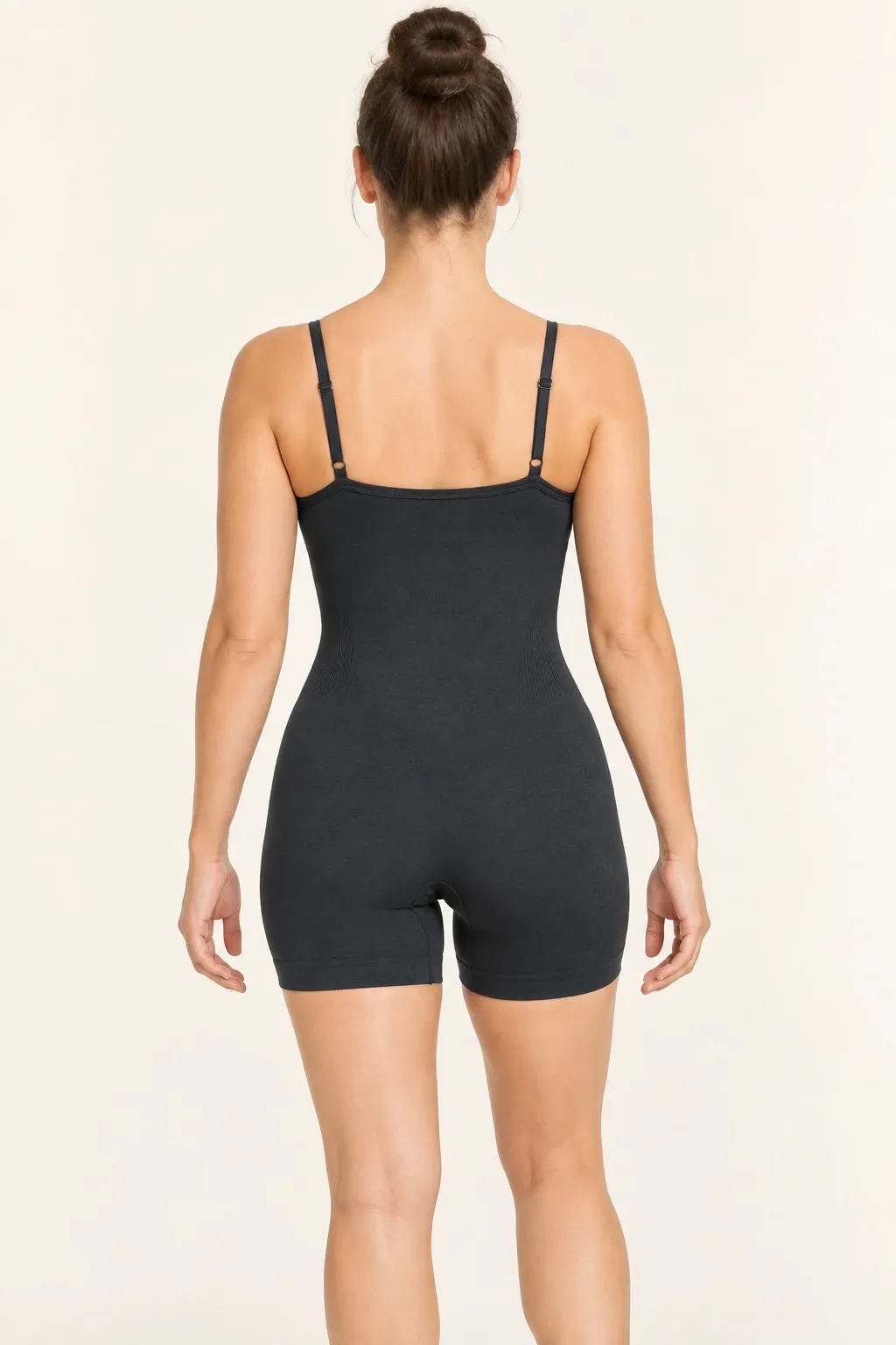 Women's black seamless cami short unitard, back view