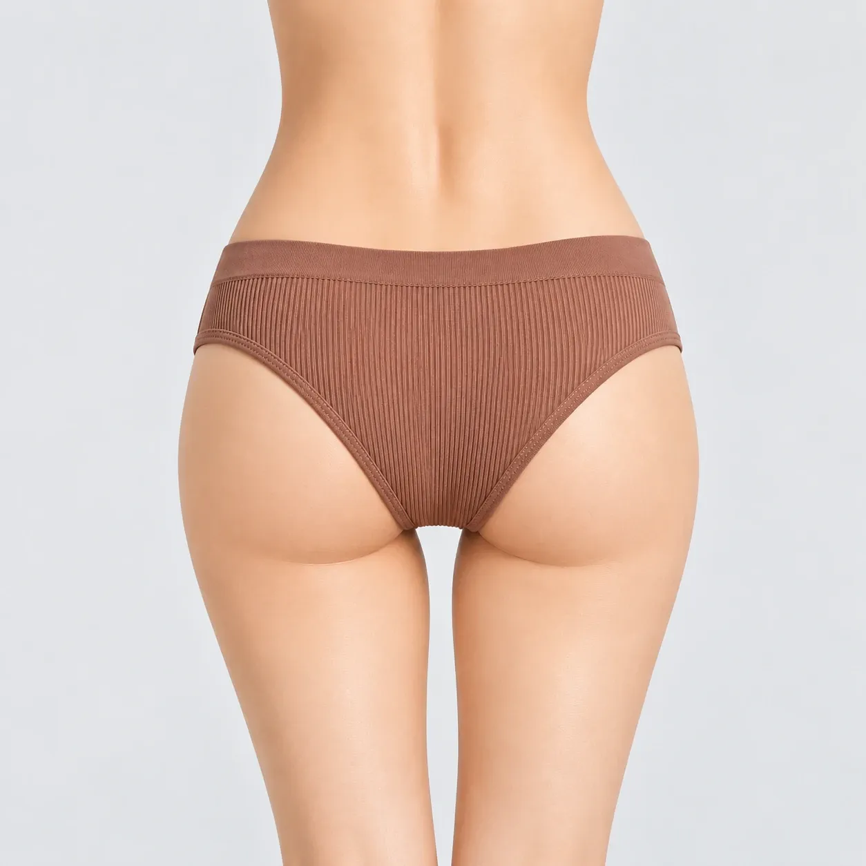 Back view of women's seamless ribbed bikini brief showing full coverage and ribbed knit texture