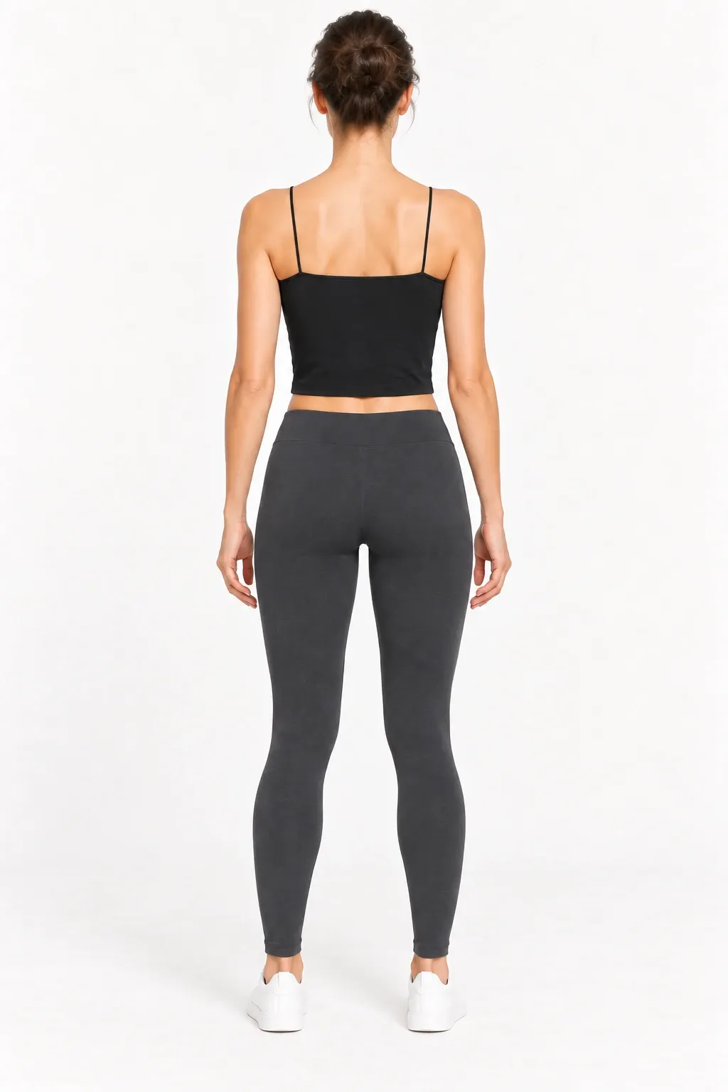 Women's black seamless spaghetti-strap cami top, back view