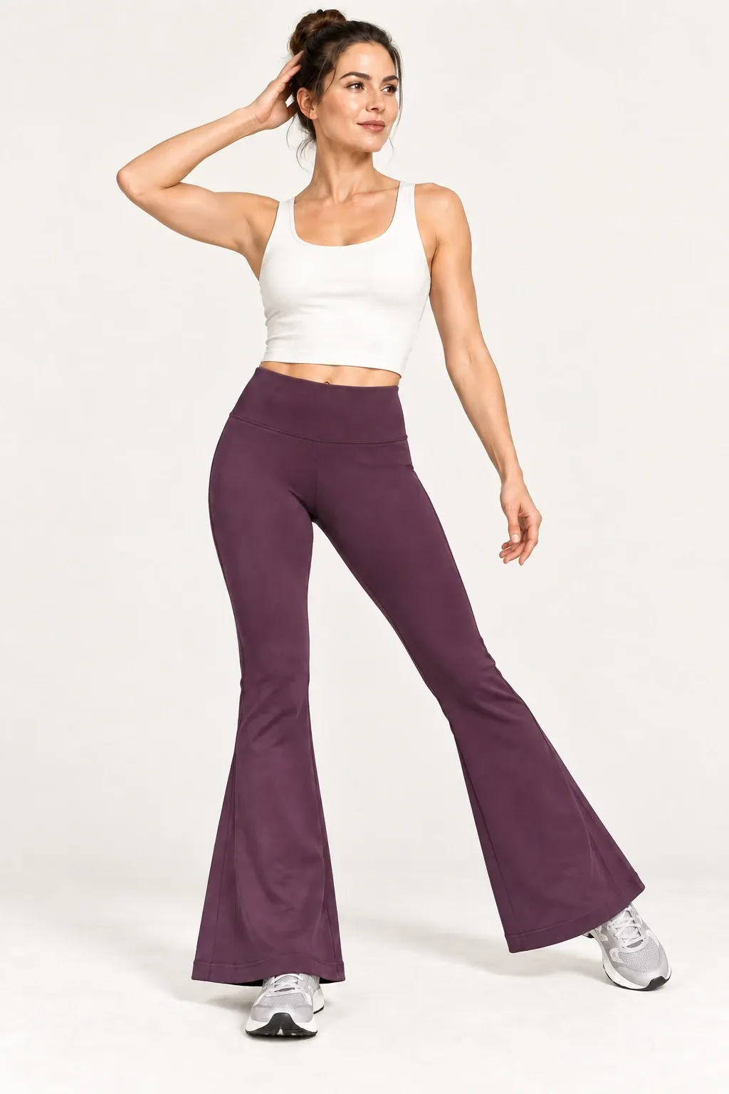 Women's burgundy seamless high-waisted flare leggings, angled front view