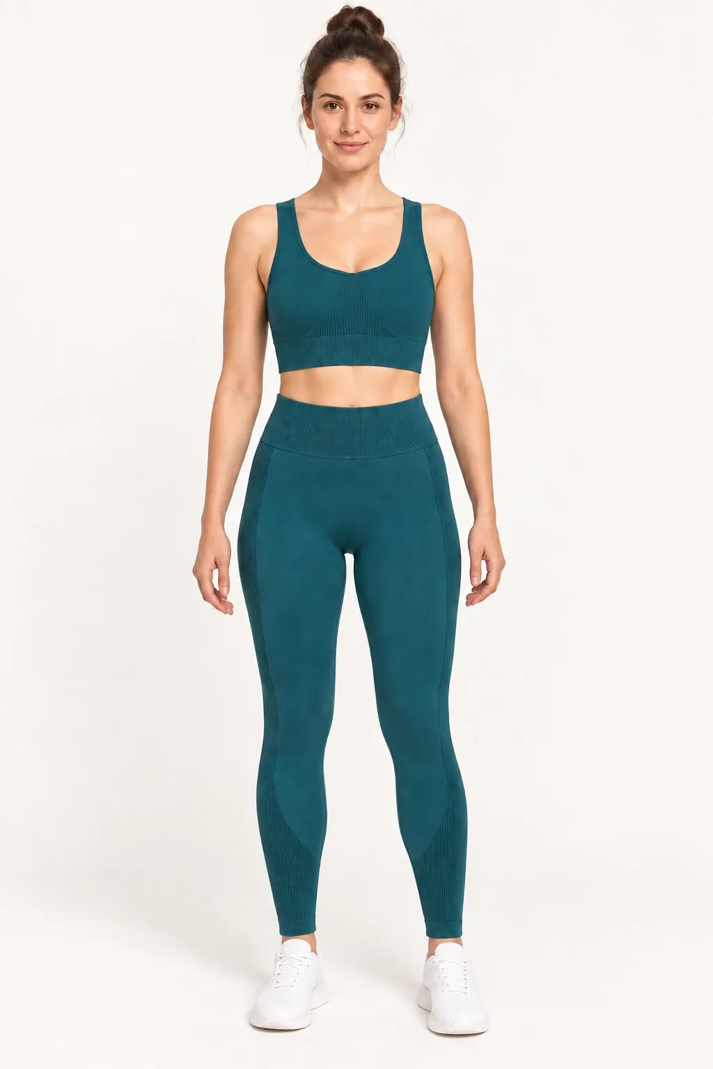 Women's teal seamless tank top and leggings set, front view
