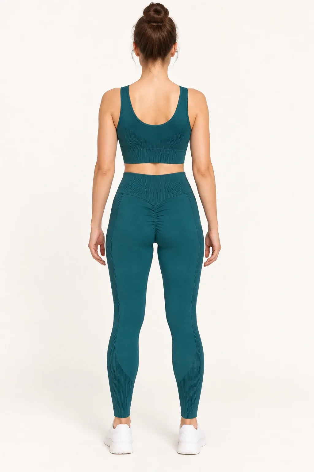 Women's teal seamless tank top and leggings set, back view