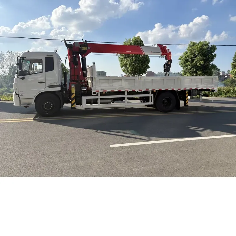 Dongfeng DFL5140XXYB1 4x2 truck-mounted crane on a road, side view with the knuckle-boom crane stowed over the dropside body