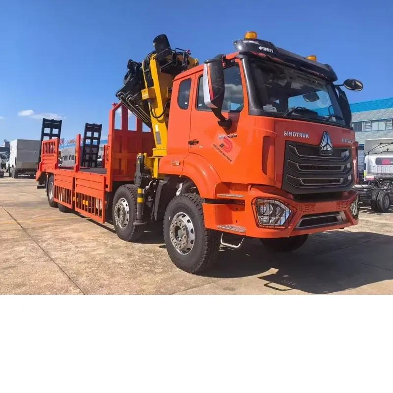 28 t XCMG knuckle-boom truck-mounted crane on a red SINOTRUK HOWO 8x4 chassis, three-quarter front view with the crane stowed over the flat-bed body