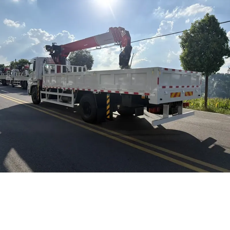 Dongfeng 4x2 crane truck driving away, rear three-quarter view of the cargo body and stowed crane