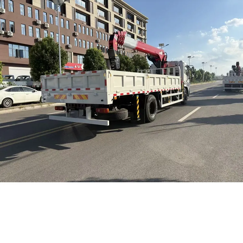 Dongfeng 4x2 crane truck, rear three-quarter view of the dropside cargo body and the stowed crane boom