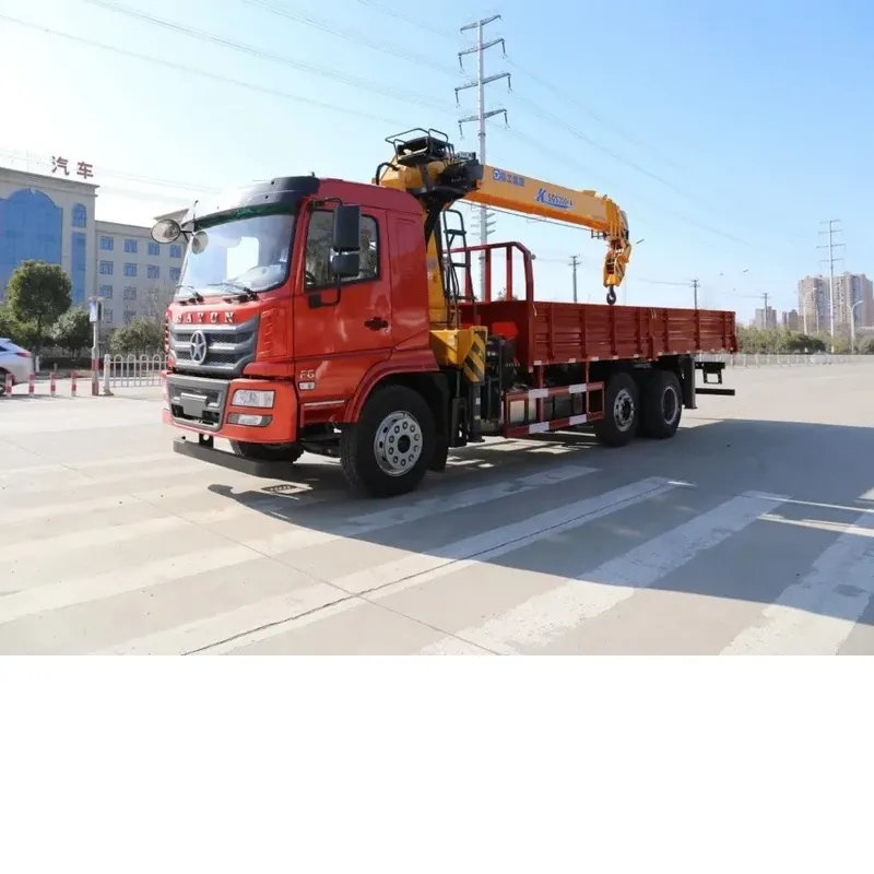 Red Dayun 6x2 truck-mounted crane, three-quarter front-left view with the yellow crane folded over the cargo body