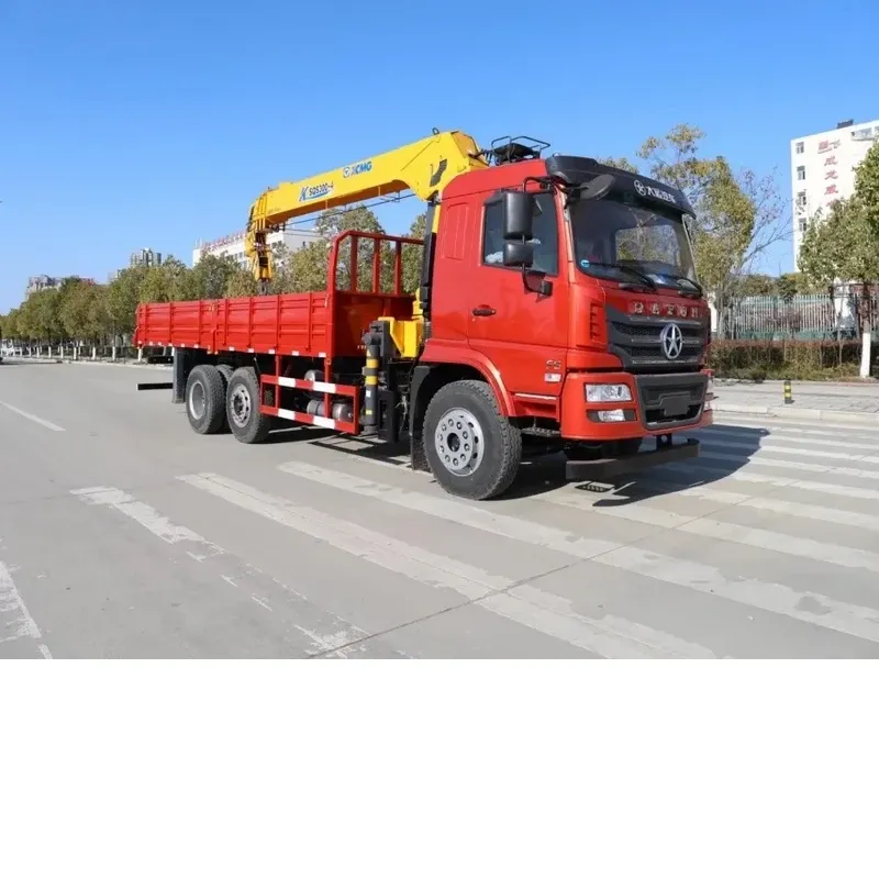 Red Dayun 6x2 crane truck with a yellow knuckle-boom crane over the drop-side cargo body, three-quarter front view