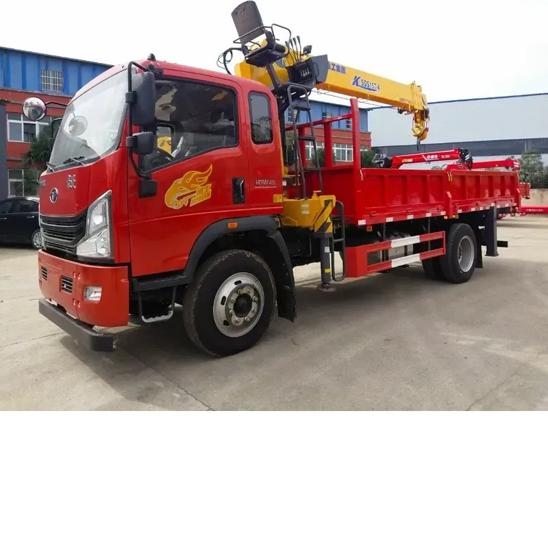 Red Howman 4500 mm truck-mounted crane, three-quarter front view with the yellow knuckle-boom crane stowed over the drop-side cargo body
