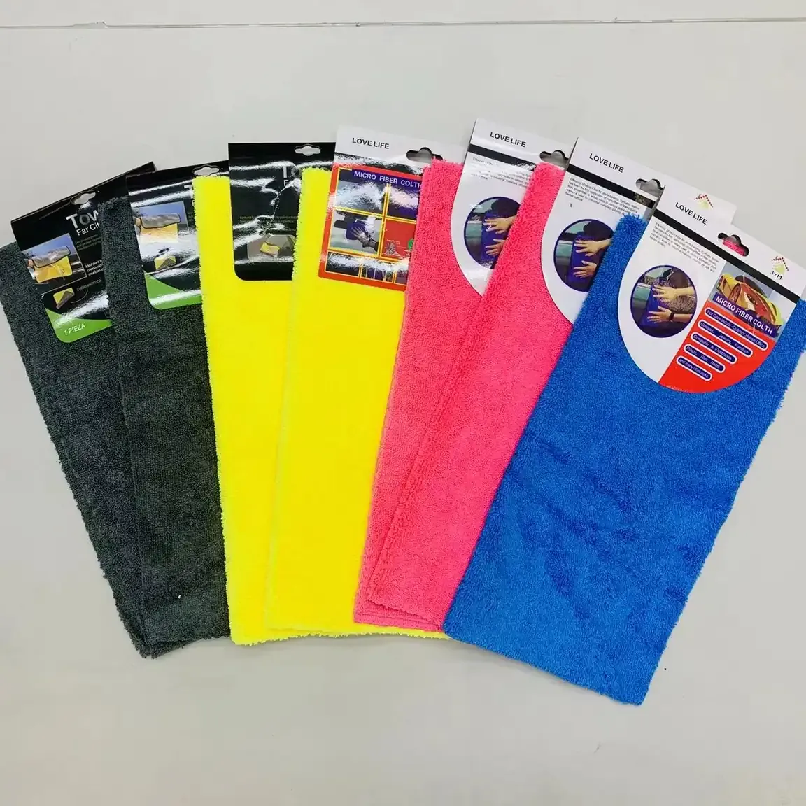 High-and-low-pile automotive cleaning towels in assorted colors with retail cards
