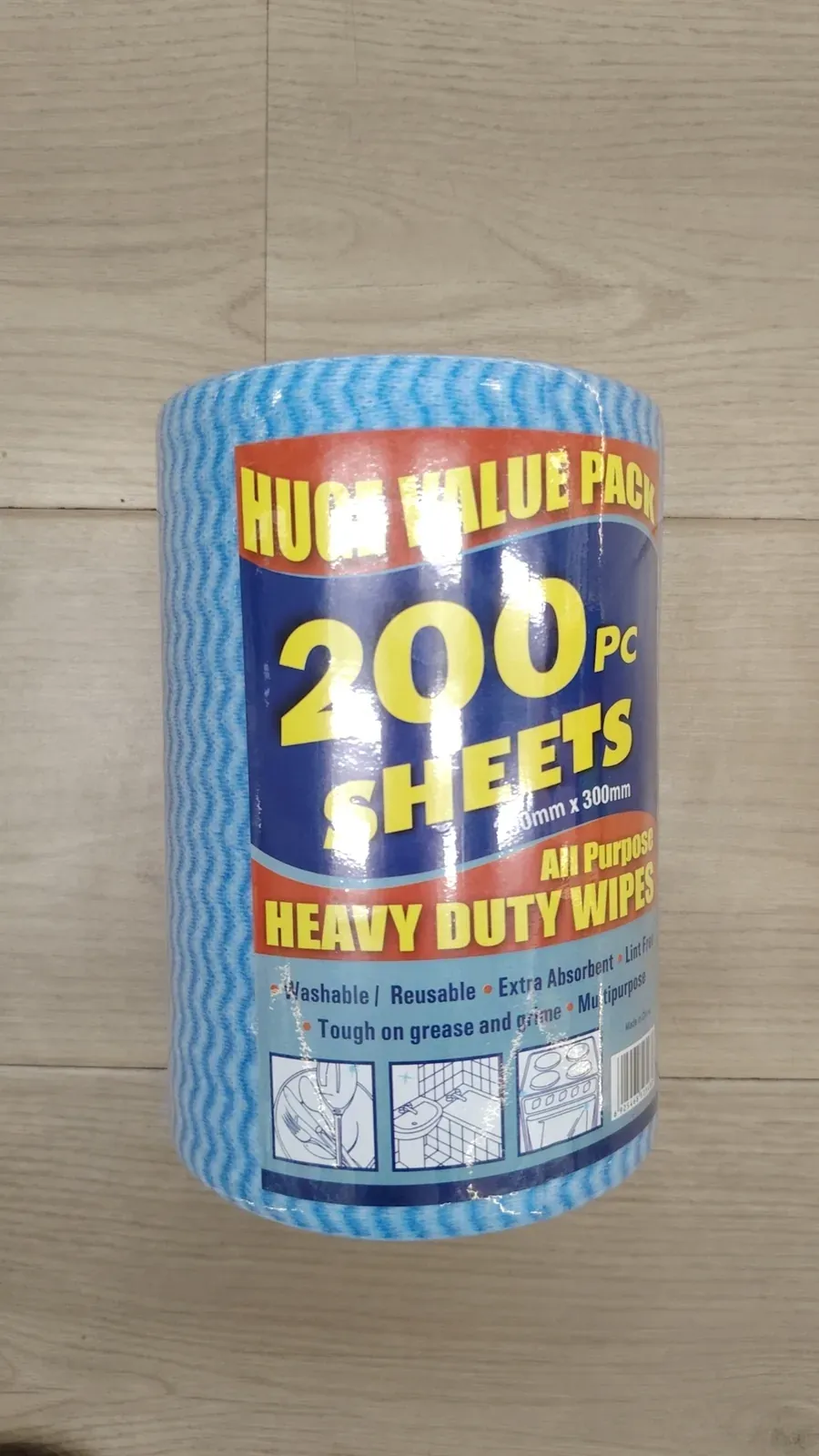 Blue nonwoven kitchen wipe roll in 200-sheet retail packaging