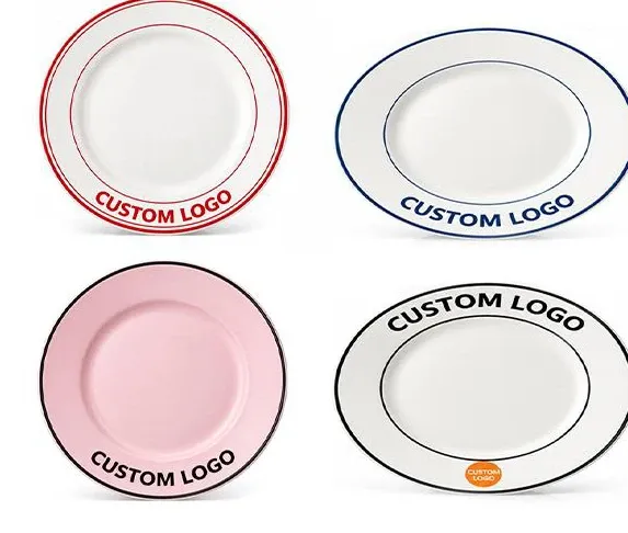 Four round ceramic plates with red, blue, pink or black accents and Custom Logo lettering near the rims.