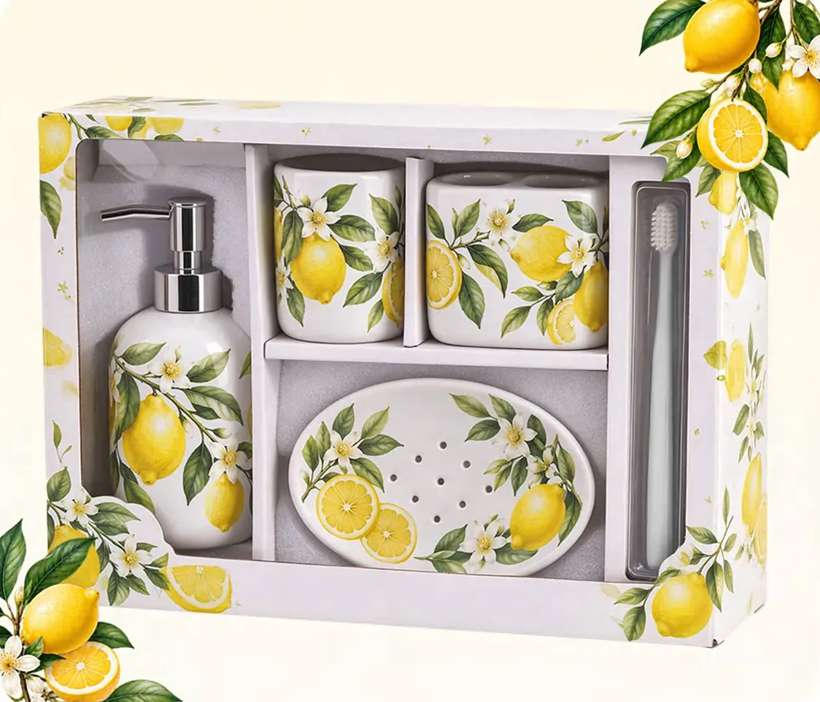 Boxed ceramic bathroom accessory set with lemon artwork, including a soap dispenser, tumbler, toothbrush holder and soap dish.