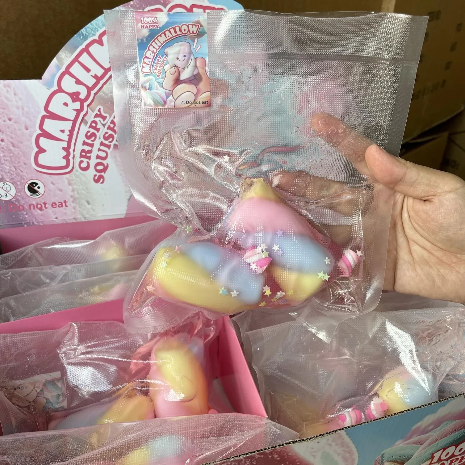 Colourful marshmallow-shaped squishy toys in individual packs