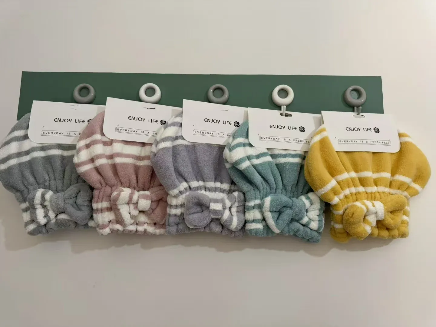 Striped compact hair towel caps in assorted colors with gathered openings