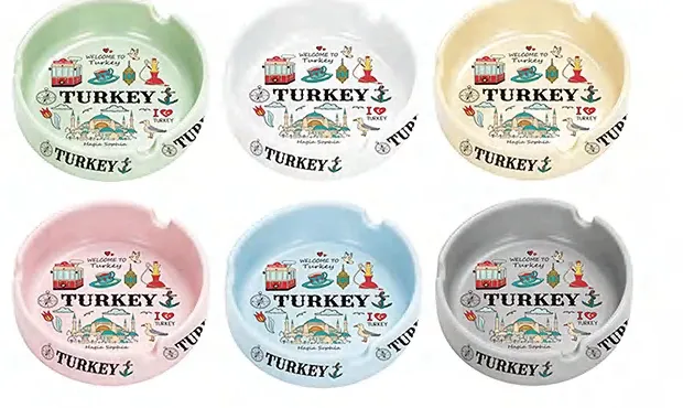 Six shallow round ceramic ashtrays with Turkey landmark illustrations and pastel-colored interiors.