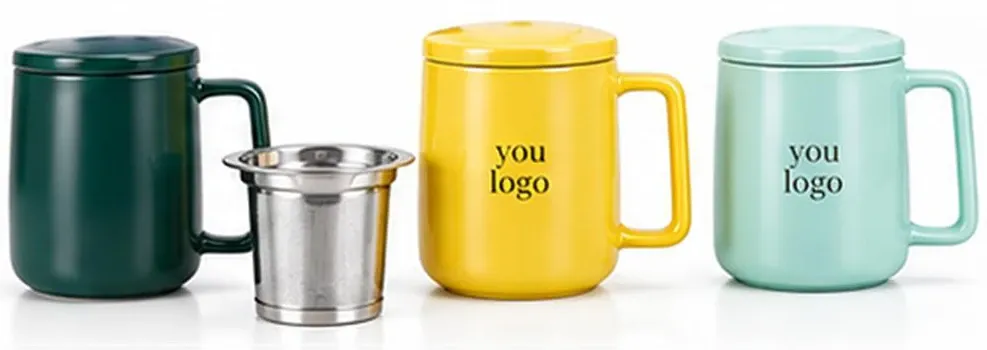 Green, yellow and mint ceramic mugs with lids, shown alongside a removable metal tea infuser.