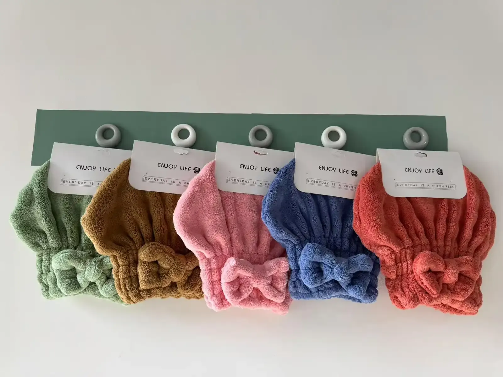 Bubble-textured hair towel caps in green, pink, blue and red
