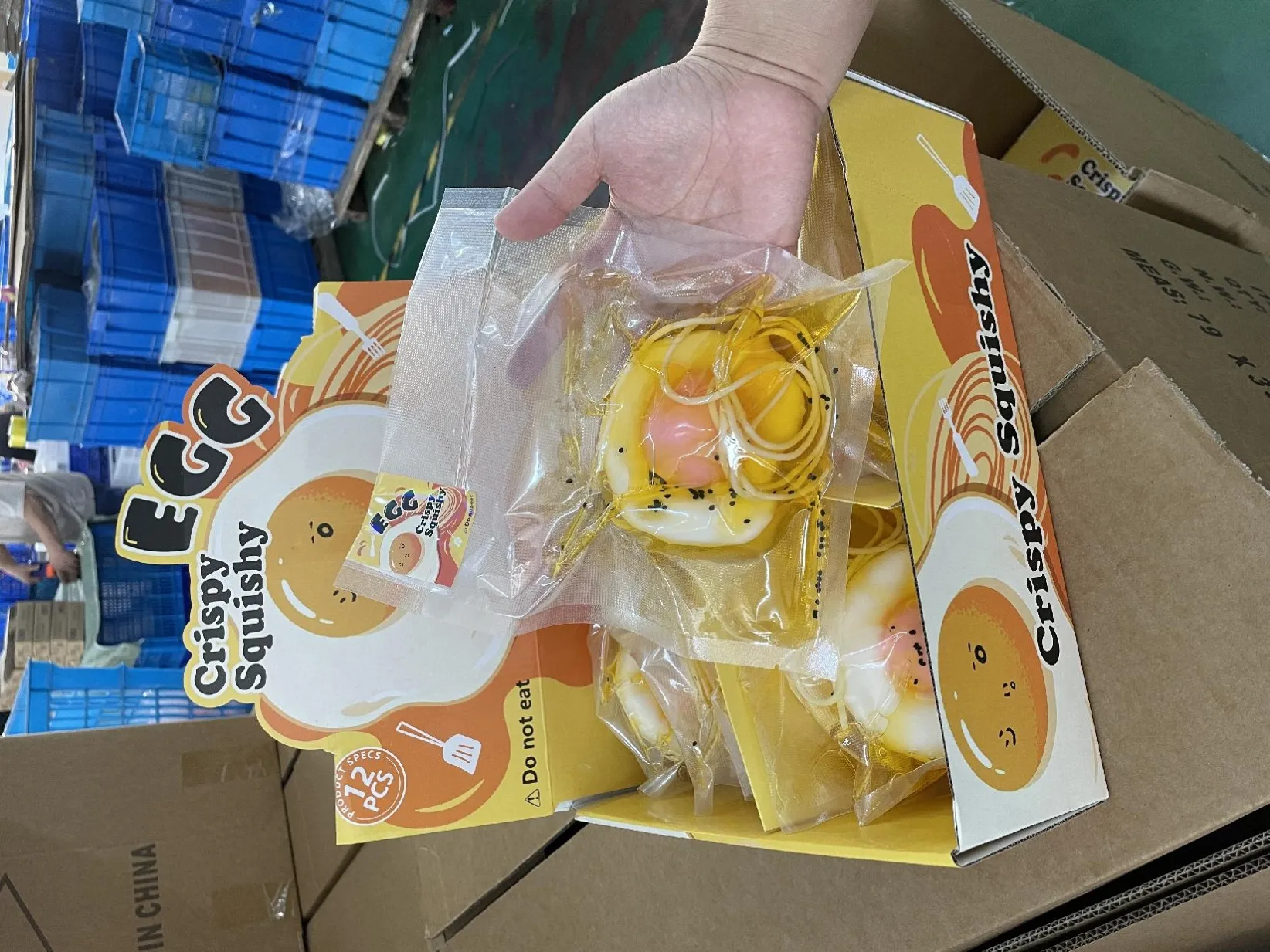 Fried-egg-shaped squishy toys in individual packs