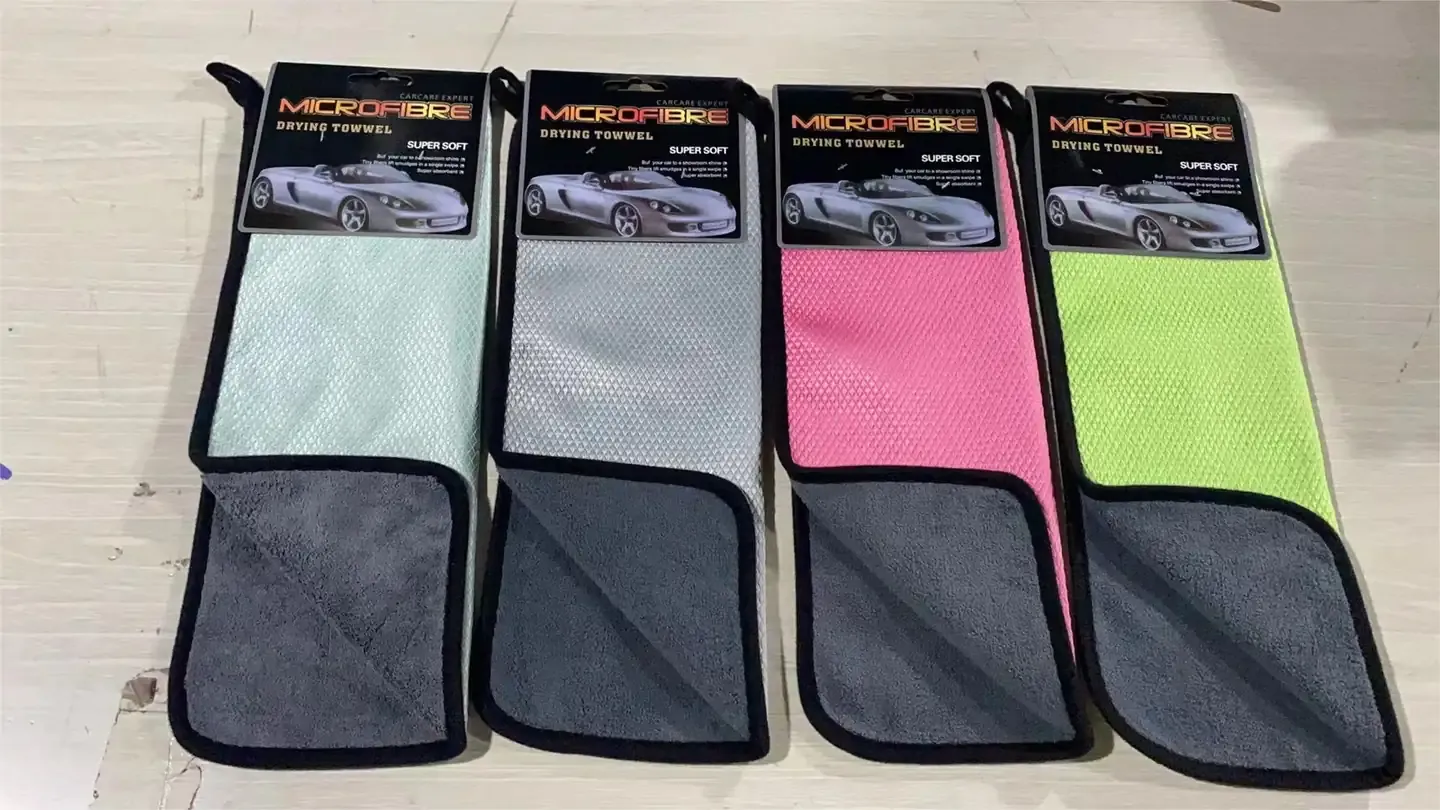 Automotive cleaning cloths with contrasting fish-scale-style surfaces