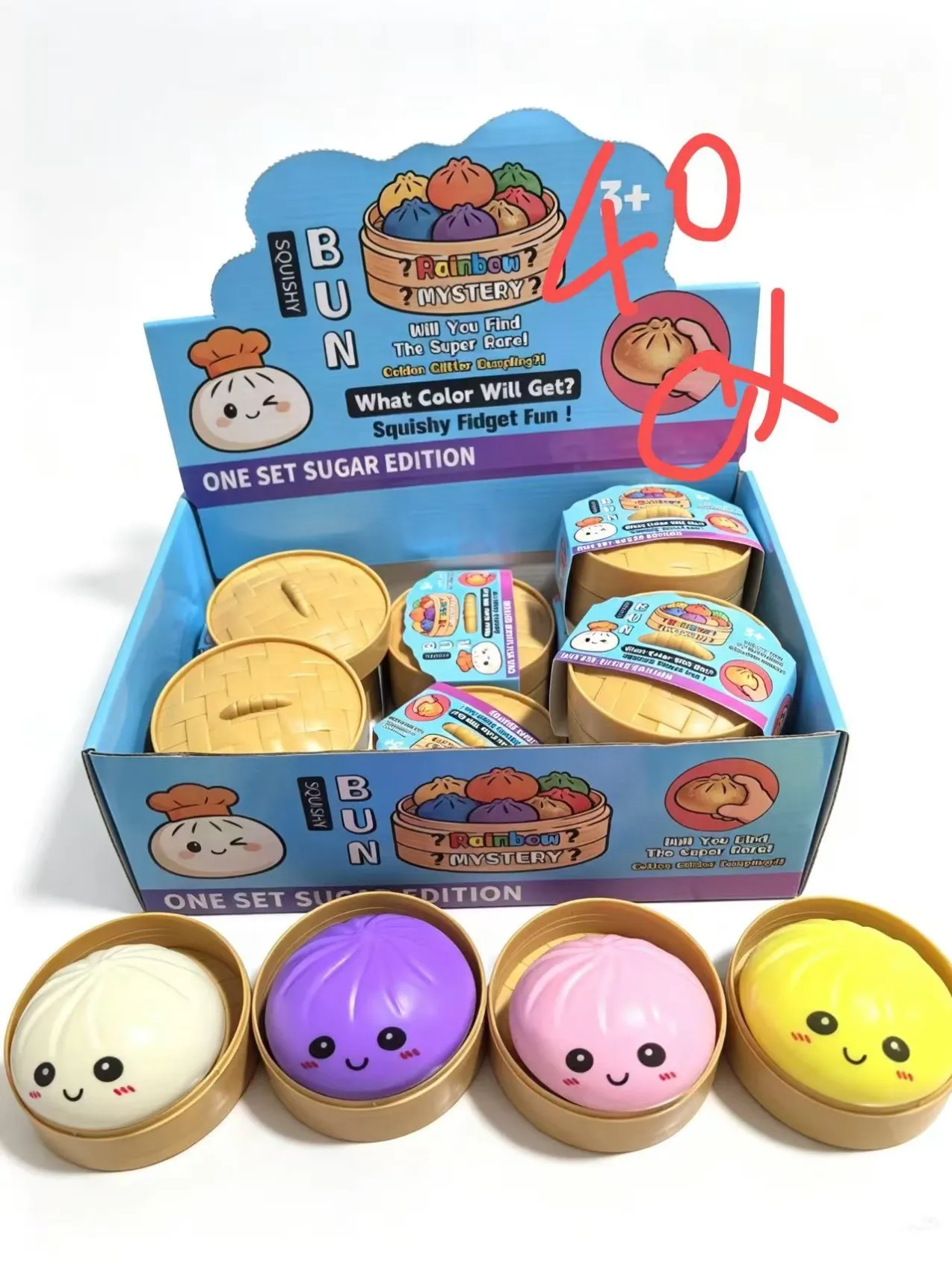 Mixed-colour dumpling-shaped squishy toys and their catalogue display packaging