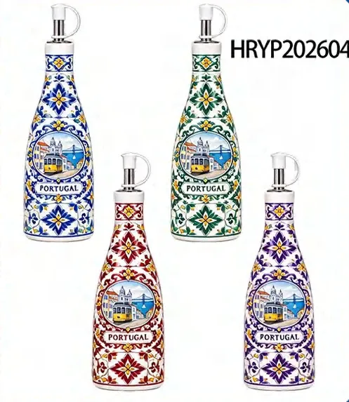 Four round-shouldered ceramic oil bottles with metal pour spouts and blue, green, red or purple Portugal patterns.