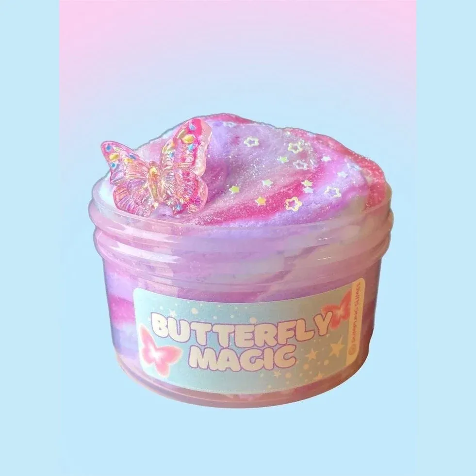 Butterfly Magic glitter slime jar topped with a butterfly charm