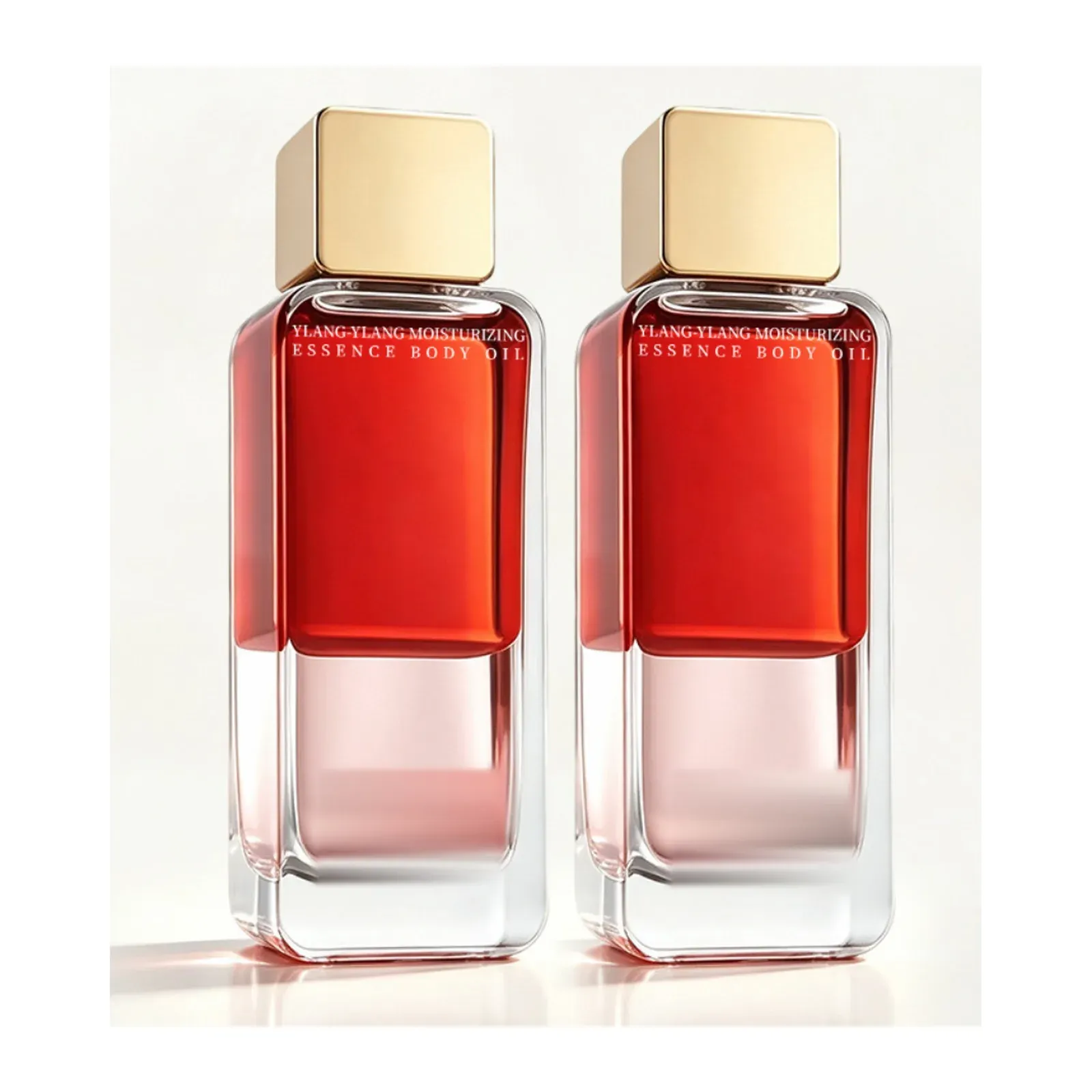 Ylang-ylang essence body oil in rectangular glass bottles with gold caps