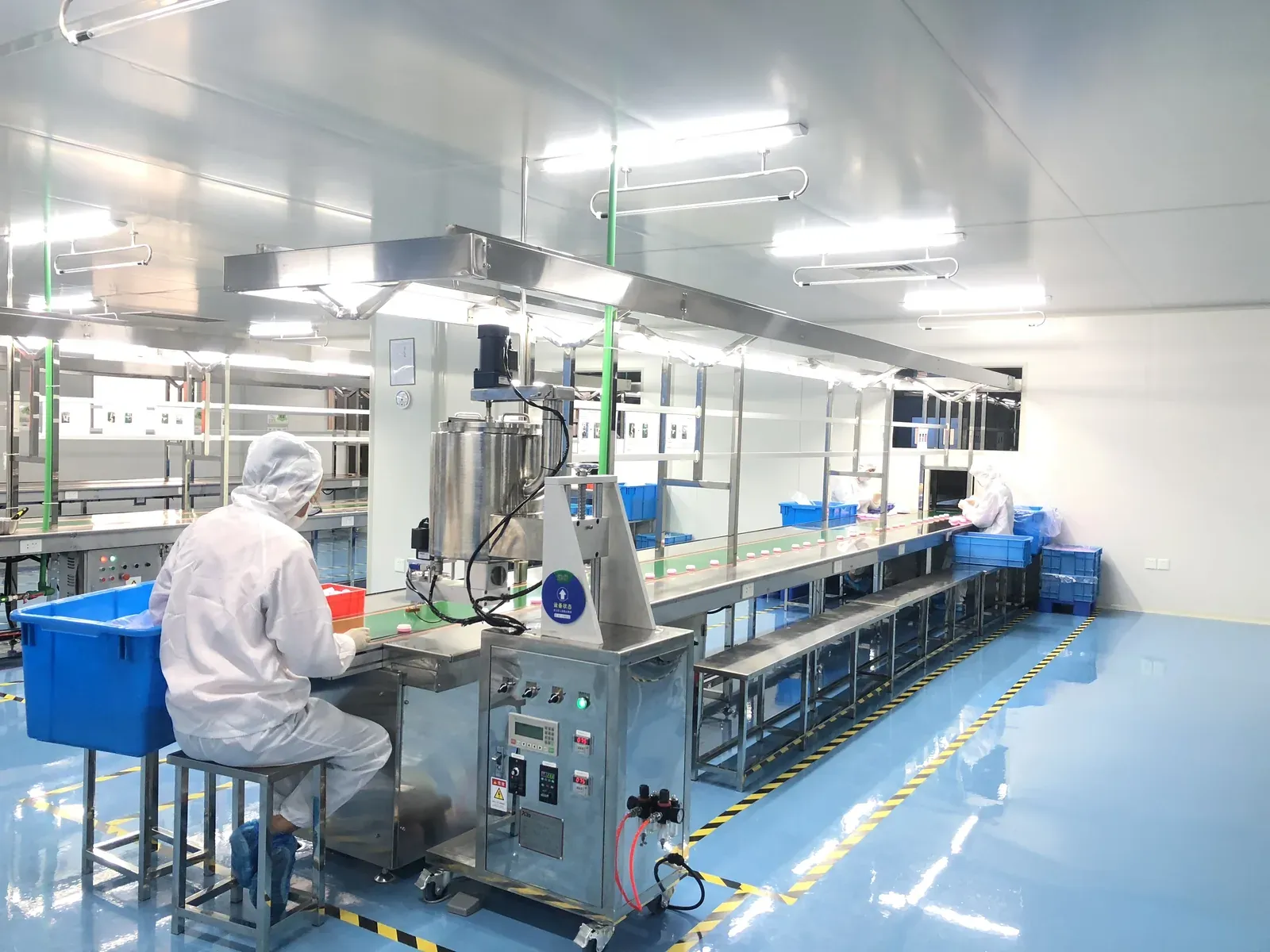 Factory - operator at filling machine