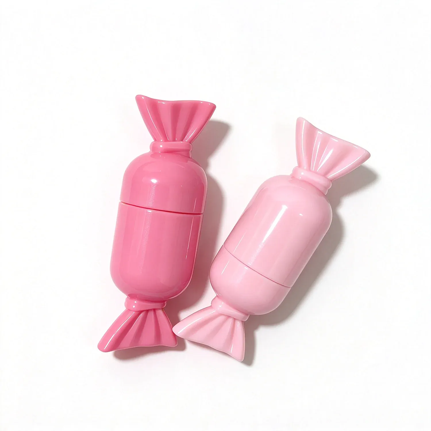 Wrapped candy shaped lip gloss tubes in pink and orange