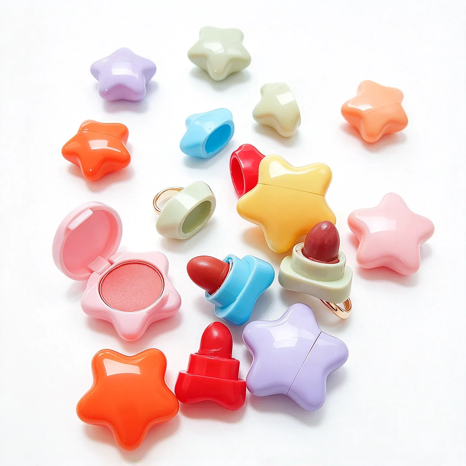 Pastel star shaped glosses scattered in pink, blue, yellow and lilac