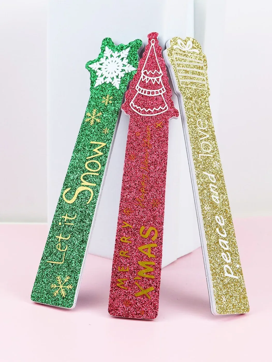 Christmas tree shaped emery boards in green, red and gold prints