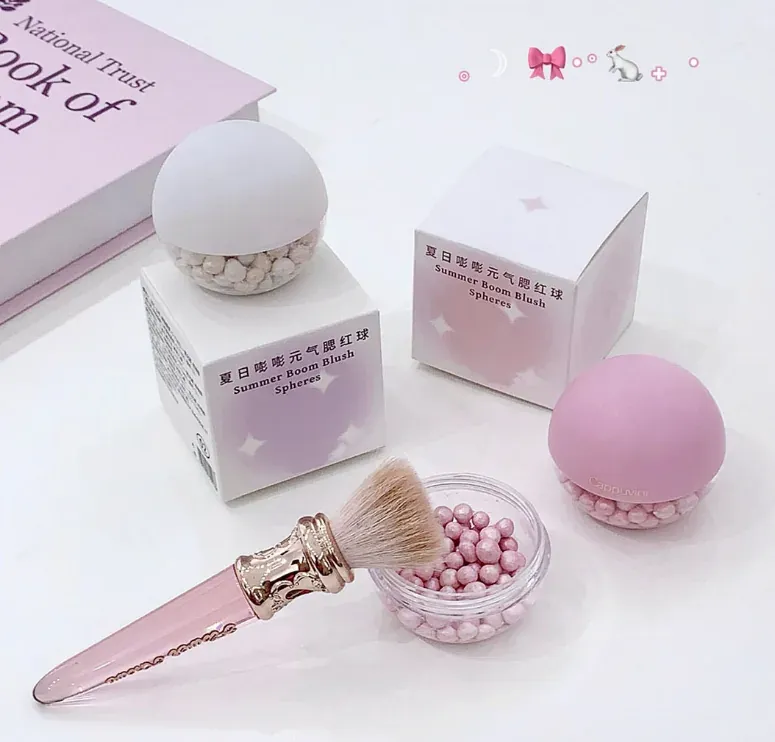 Summer Boom blush spheres in pearl-filled jar and round case with brush