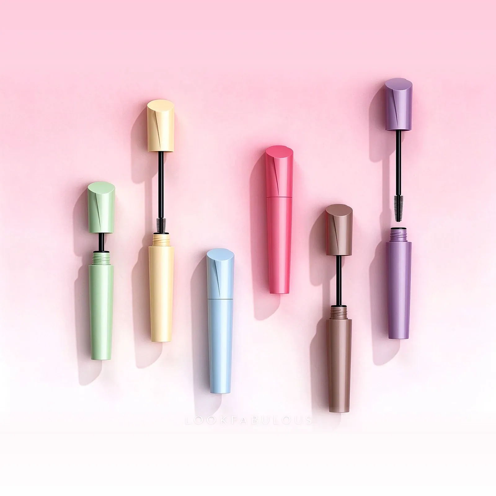 Six pastel metallic mascara tubes in green, yellow, blue, pink, brown and purple
