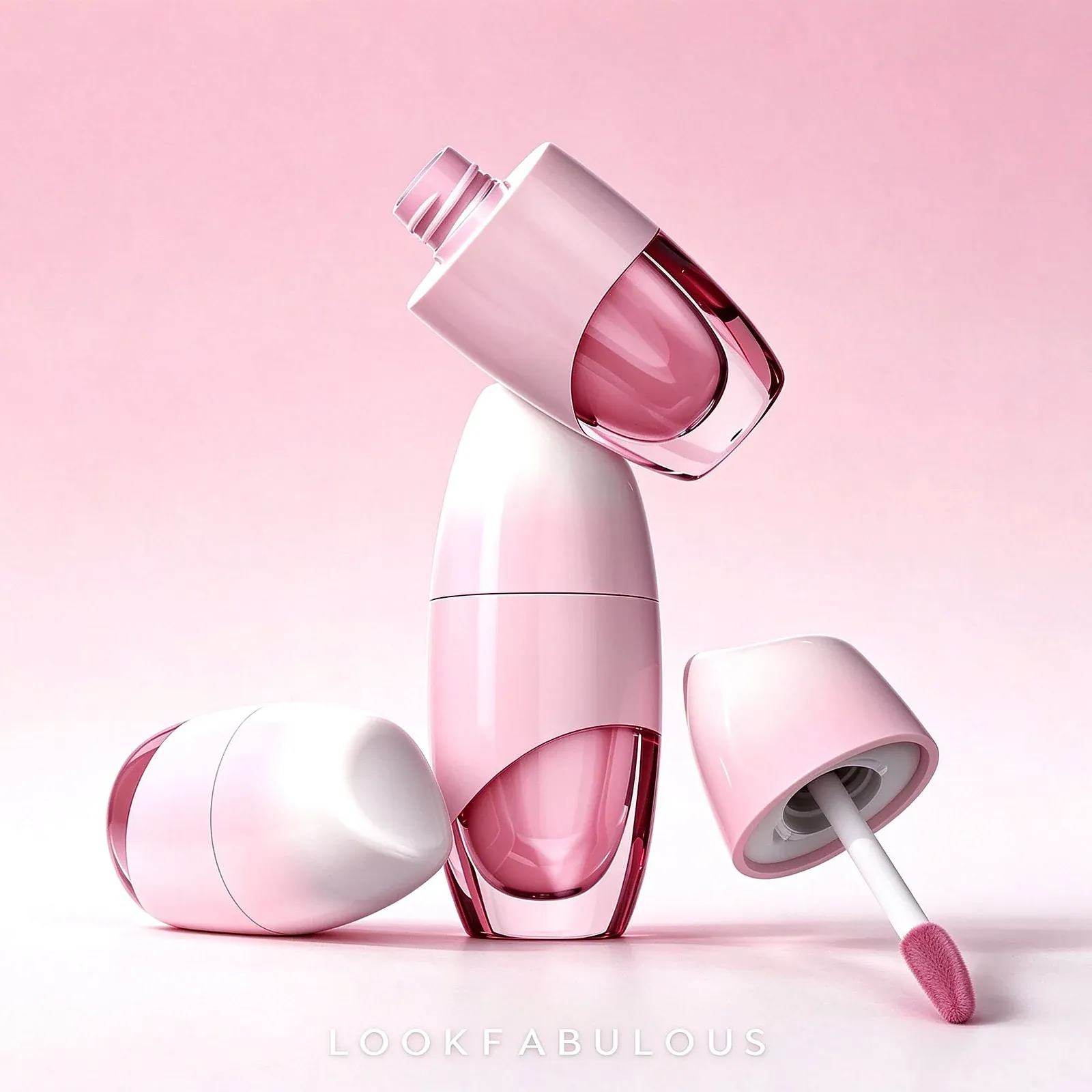 Capsule shaped lip gloss tubes with cream and pink shells, clear windows and a doe-foot wand
