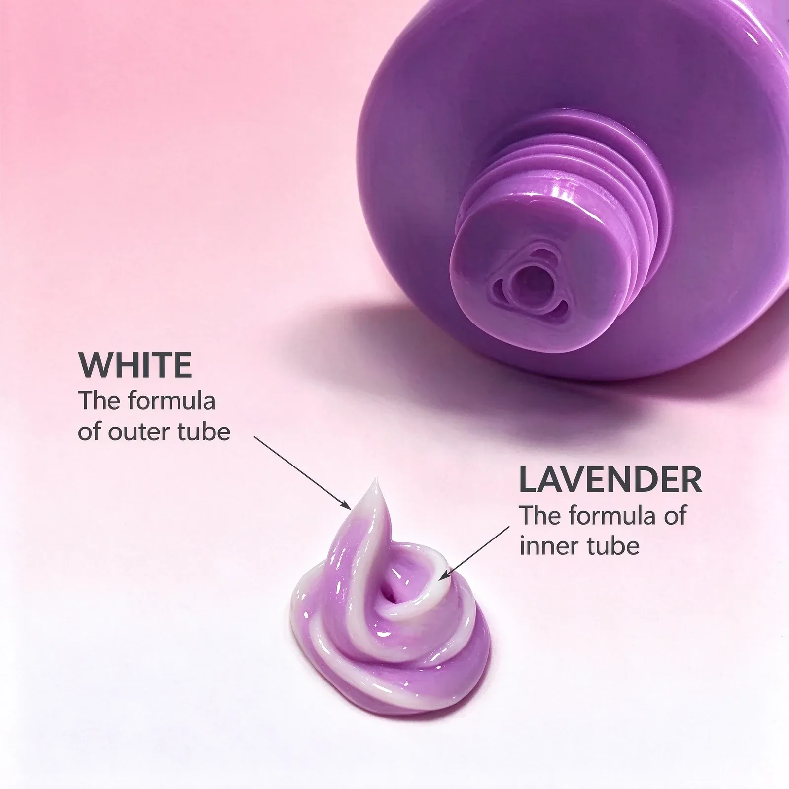 Purple hand cream tube with a two-tone lavender and white cream swirl on a pink background