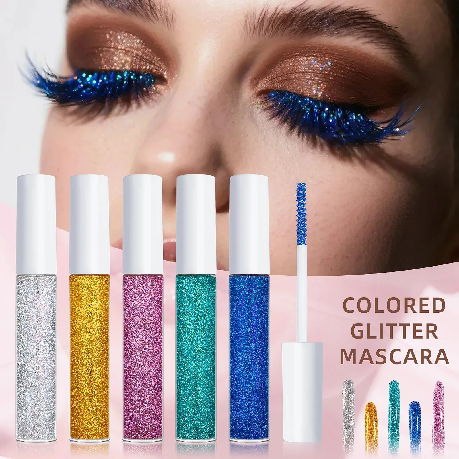 Coloured Glitter Mascara Set - Five tall clear tubes with white caps holding silver, gold, magenta, teal and blue glitter, plus a sixth white wand loaded with blue glitter.