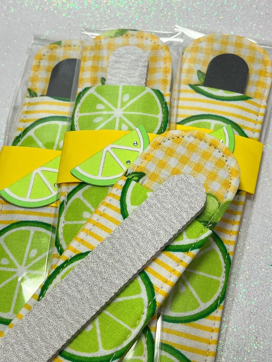 Citrus print emery boards with lime slice design and sleeves