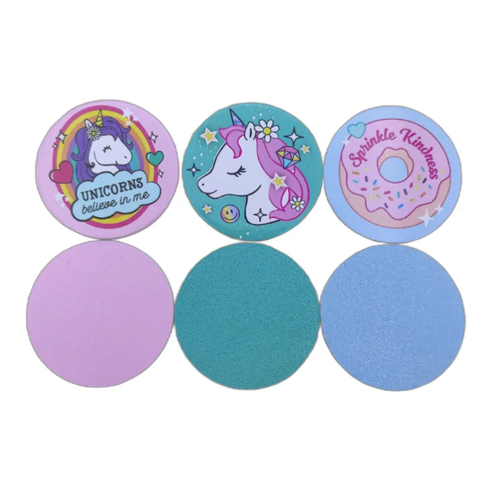 Round nail file pads with unicorn, flower unicorn and donut character art and speckled backs