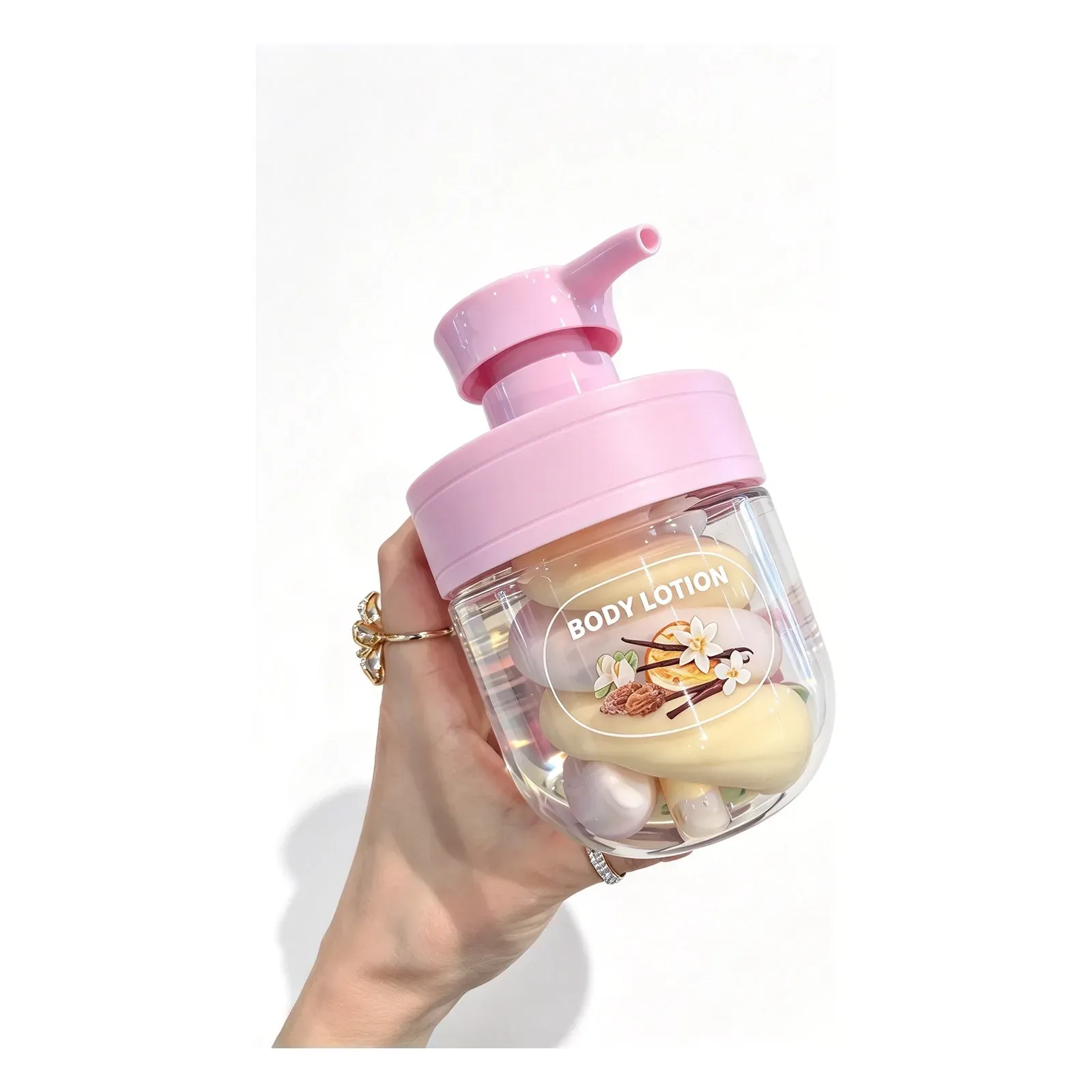 Blossom bar body lotion in a pink pump bottle with oval lotion bars and floral label
