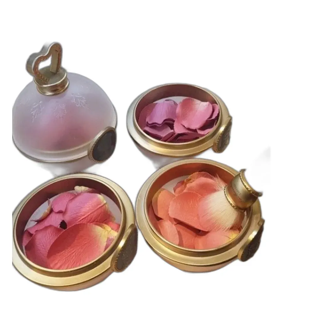 Rose petal blush pieces in round gold compact with brush