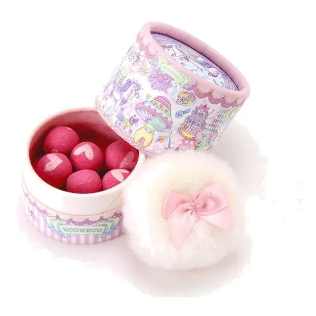 Heart-embossed pink blush balls in a keepsake box with fluffy puff